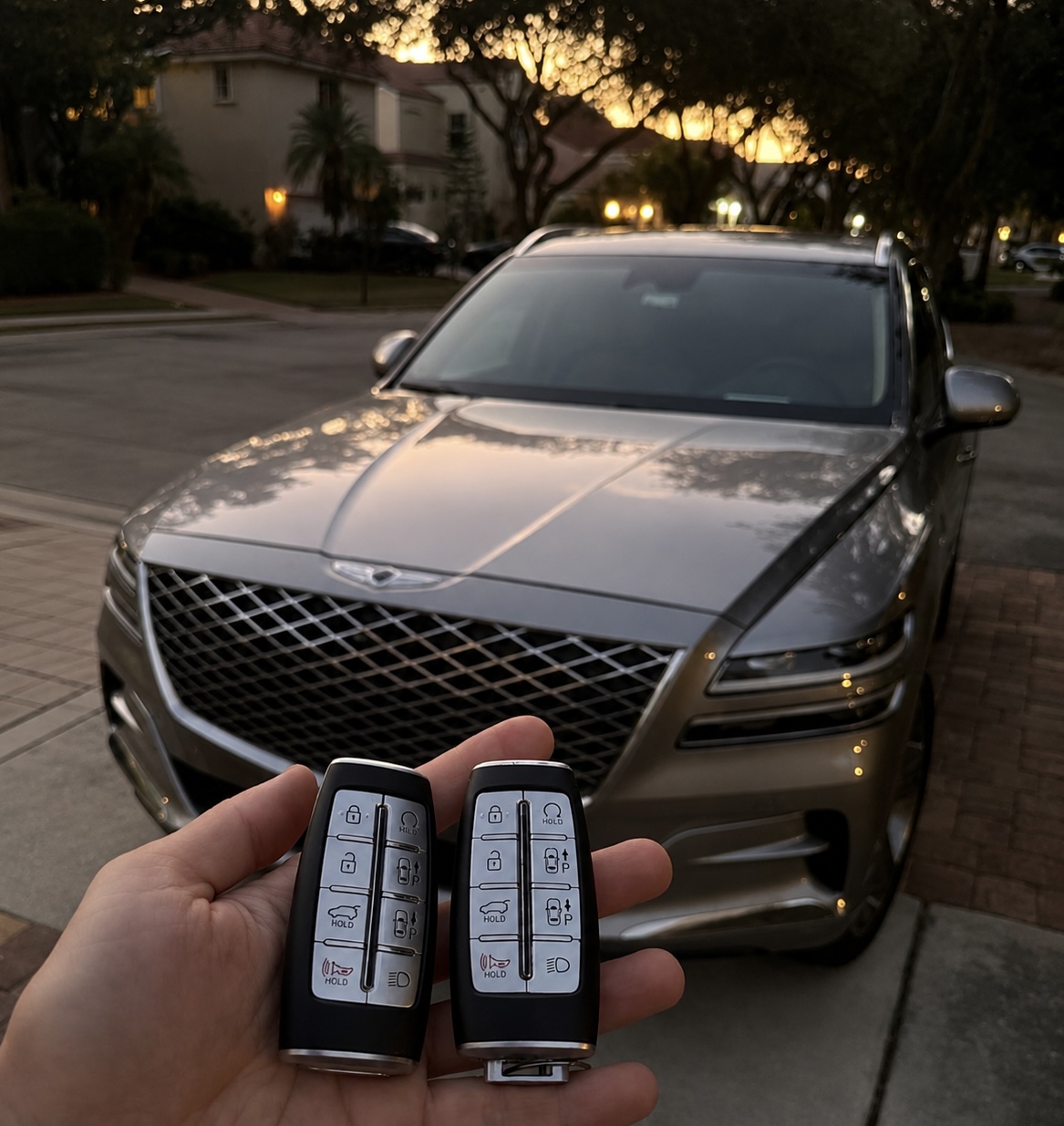 Genesis GV80 — Smart Key Pair at Golden Hour
