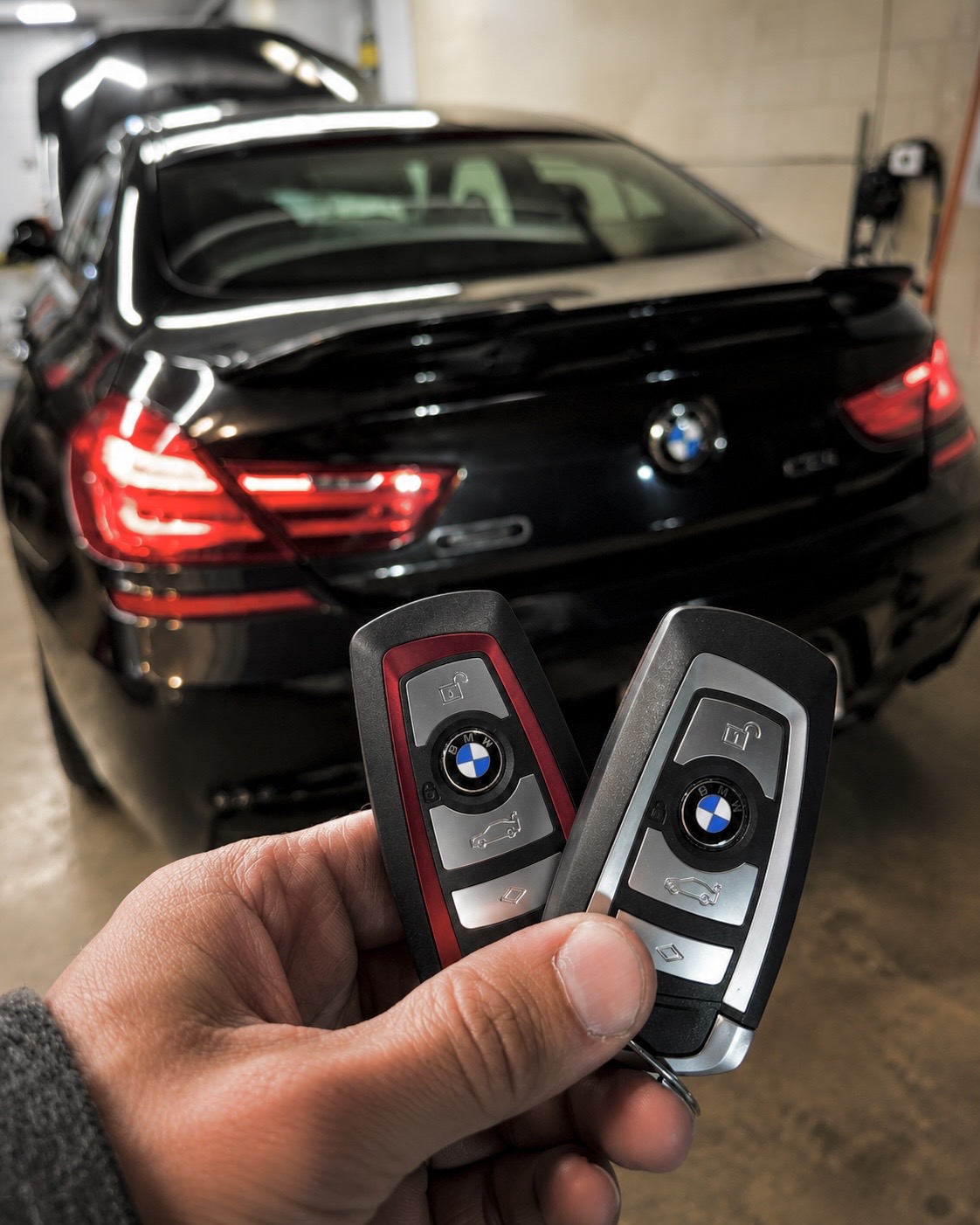 BMW smart keys paired for a black coupe